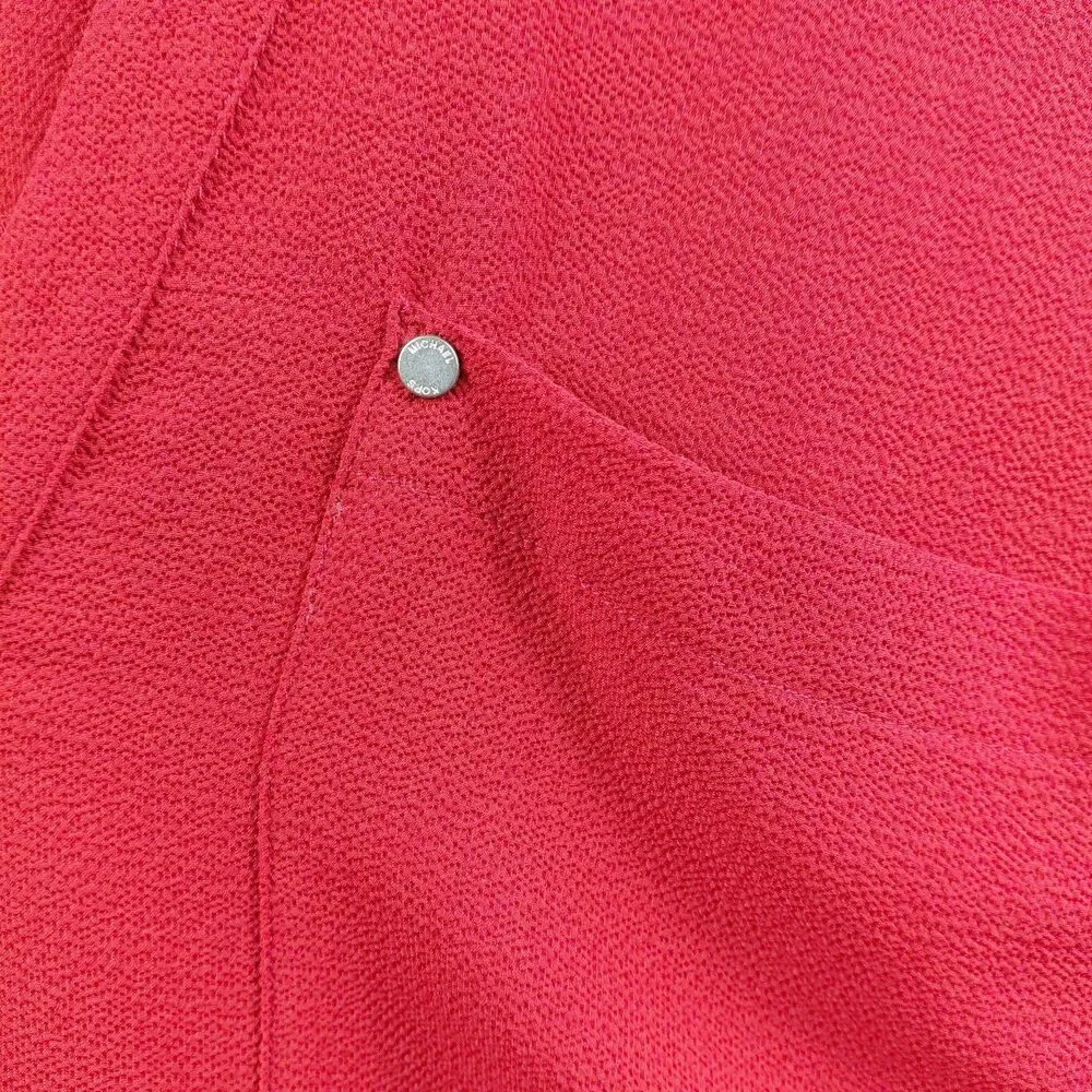 Michael Kors removed material